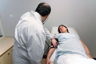 doctor examing pregnant woman