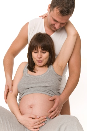 expectant parents practicing for childbirth